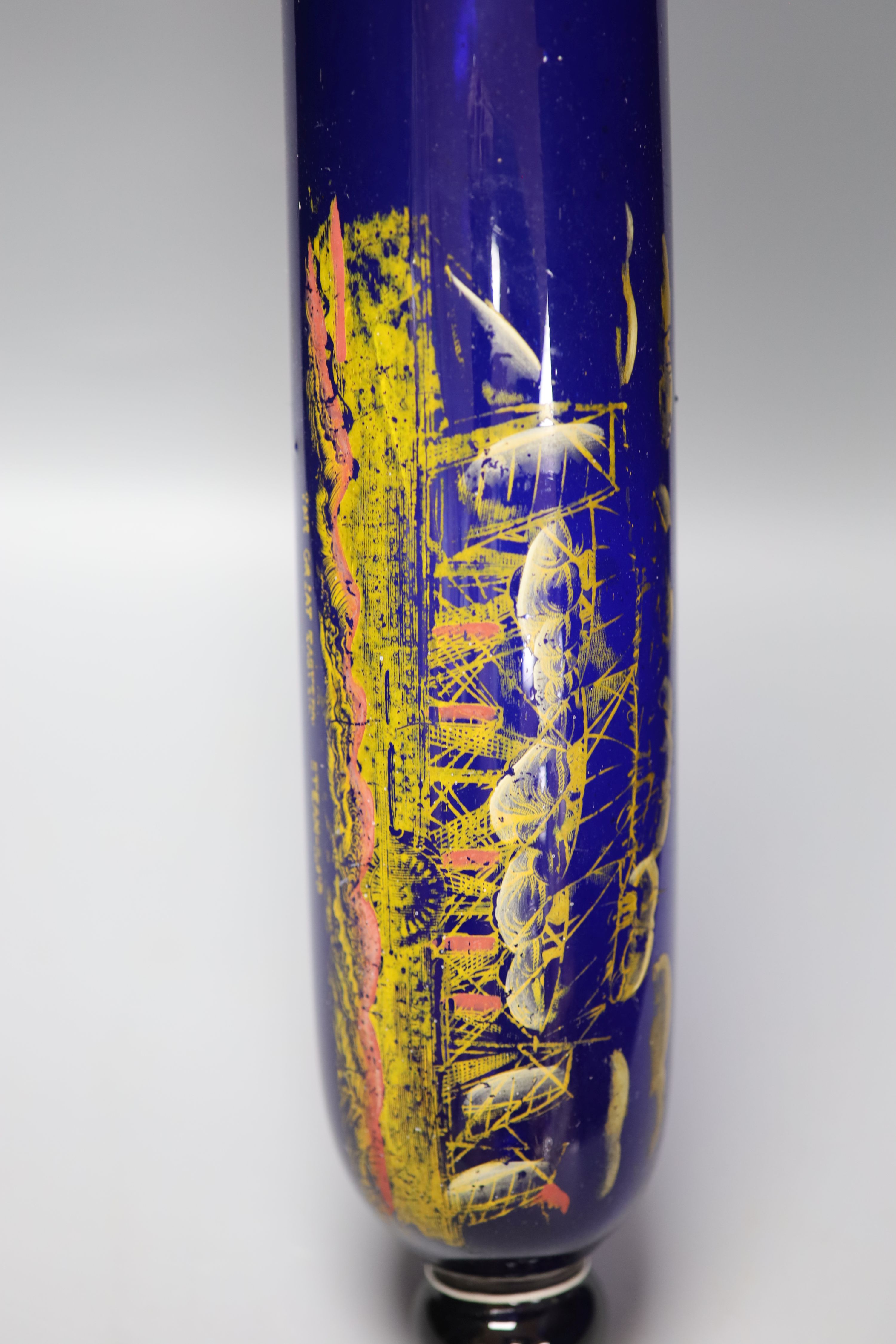 A large 9th century painted glass rolling pin, length 71cm